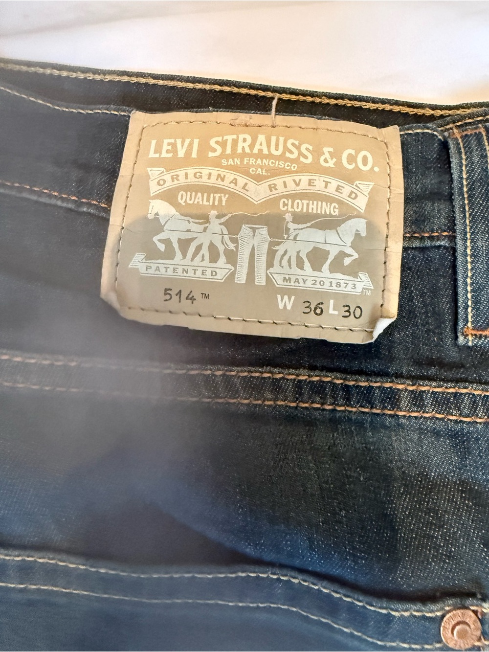 Levi's Men's Slim Straight Dark Blue Jeans with Tan Patch